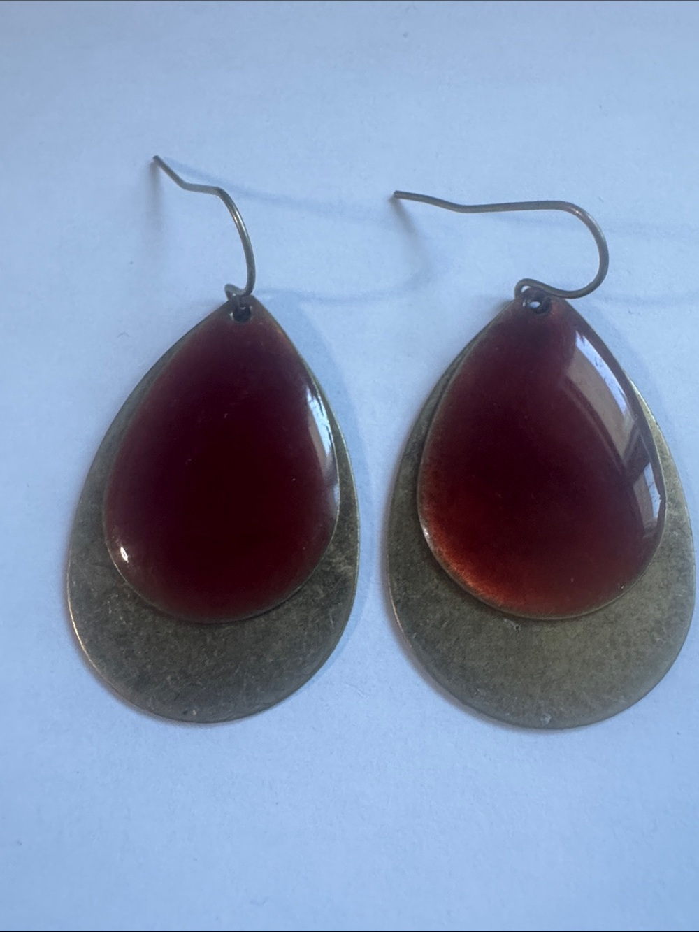 Handcrafted mixed metal layered teardrop earrings.